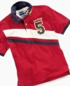 He'll be prepped and ready to play in this sporty polo shirt from Tommy Hilfiger.