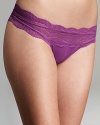 Low rise with a wide waistband, Cosabella's stretchy lace thong is an everyday classic. Style #DOLCE0321.