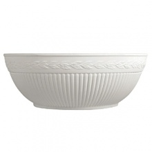 Edme serving bowl by Wedgwood. Wedgwood marks the 100th anniversary of its classic Edme collection with a refreshing update of its timeless pattern. A new antique white glaze enhances the elegant colannade embossment and laurel motif accent pieces. Sophisticated shapes and generously sized pieces make this pattern ideal for today's lifestyle.