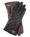 Join the quilted crowd with these luxe, leather gloves from MICHAEL Michael Kors. Chic signature-embossed  detailing adds a touch of elegance, for a look that's altogether exquisite.