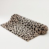 The call of the wild! Luxe bath rug made from a plush cotton. Fashioned in an exotic cheetah print to liven up the bath area.