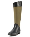 Contrasting materials add a unique feel to these classic Burberry rain boots, constructed in a military green that pairs surprisingly well with all rainy day attire.