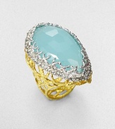 From the Elements Siyabona Collection. Atop an openwork woven band of glowing goldtone sits a faceted oval of pastel chalcedony, in an X-motif setting edged with shimmering Swarovski crystals.Peruvian chalcedonyCrystalGoldtone and rhodium platingLength, about 1.5Made in USA