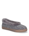 Slip chilly toes into these cozy, cable knit slippers, lined with soft shearling by UGG® Australia.