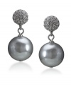 Chic sophistication in silver hues. These magical earrings by Carolee feature a crystal coated stud and a large charcoal-colored glass pearl drop (14 mm). Crafted in silvertone mixed metal. Surgical steel posts. Approximate drop: 1 inch.