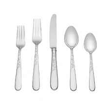 An iconic kate spade new york engraved dotted pattern accents this elegant flatware.