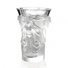 From a master in crystal, Lalique's Fantasia Vase enchants with hand-cut, frosted long-locked sirens set against a clear upper portion.