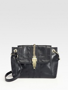 Supple leather channels rock n' roll chic in this flap front design, finished with chunky chain hardware.Shoulder strap, 19 dropMagnetic snap flap closureOne inside zip pocketTwo inside open pocketsFaille lining11¾W X 8H X 4DImported