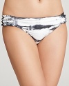 Lucky Brand's tie dye bikini goes sleek and chic in a neutral greytone print. Stay subdued in classic aviators or pump up the volume with bold colored accessories.