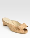 Natural cork style with a demi wedge, peep toe and timeless bow adornment. Self-covered wedge, 1 (25mm)Cork upperSuede liningExclusive rubber solePadded insoleImported