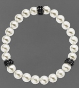 Slip a little elegance over your wrist. Kaleidoscope's pretty bracelet features a mix of cultured freshwater pearls (8 mm) and sparkling stations made from black crystals with Swarovski Elements. Bracelet stretches to fit wrist. Approximate length: 7-1/2 inches.