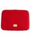 Whether you hold your meetings in the corner cafe or the conference room, this vibrant laptop case from MICHAEL Michael Kors keeps your computer safe in bold style.