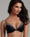 An alluring lace contour bra with contrast lace trim along neckline and wings.