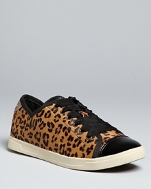 Get a running start on the exotics trend in these leopard print DKNY sneakers. With trendy black patent cap toes, they have enough edge to keep things cool.