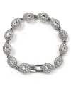 Embellished with crystals, Carolee's stone bracelet sparkles with day-to-night appeal. Wear this extra with a white blouse to elevate a tailored look--cuff the sleeves for maximum shine.