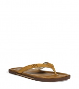 Inject sophisticated summer-ready style to your look with these leather sandals from UGG Australia - Classic thong style, textured leather strap - Pair with shorts, a short sleeve button down, and a straw fedora