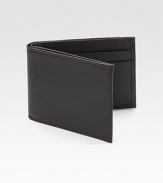 EXCLUSIVELY OURS. An everyday essential in a slightly slimmer design crafted of rich, pebbled leather.One bill compartmentFour credit card slots4¼ X 3Imported