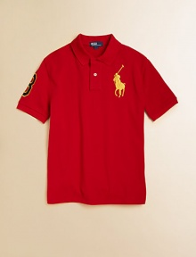 A classic polo shirt features signature Big Pony embroidery and an applied 3 patch for sporty style.Polo collarShort sleevesButton-frontUneven vented hemCottonMachine washImported Please note: Number of buttons may vary depending on size ordered. 