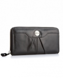 A simple leather wallet with plenty of organizational pockets and zip around closure from Kenneth Cole Reaction.