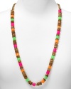 A mix of neon enamel and wooden beads lends an artsy, modern aesthetic to kate spade new york's single strand necklace.