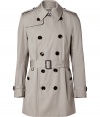 Invest in high style with this ultra-chic trench from Burberry London - Small spread collar, long sleeves with belted cuffs, epaulets, double-breasted, front button placket, belted waist - Fitted silhouette - Pair with slim trousers or jeans and a cashmere pullover