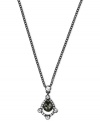 Take center stage. Givenchy's necklace, crafted from hematite-tone mixed metal, features a stunning pendant with glass stones and cubic zirconia accents for a radiant effect. Approximate length: 16 inches + 2-inch extender.