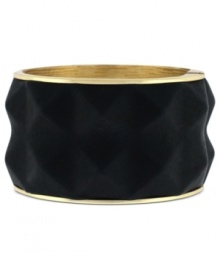 Black and gold brings edgy elegance to Vince Camuto's bracelet style. A pyramid design boasts rich leather. Crafted in gold tone mixed metal. Approximate diameter: 2-1/2 inches.