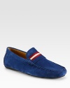 Classic design in smooth suede with stripe detail.Suede upperLeather liningPadded insoleRubber soleImported