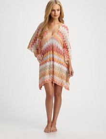 A delicately designed coverup with gorgeous colors and details.ScoopneckDolman sleevesRayonHand washMade in Italy