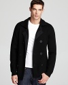 Rendered in soft wool, this peacoat-inspired sweater exemplifies the skillful innovation of Vince.