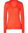 Building a coveted capsule wardrobe is easy with stylish staples like Iris von Arnims chili orange pullover - Sumptuously soft in a luxe, lighter weight merino wool knit - Fitted, feminine cut tapers gently through waist and hits below hips - Long sleeves and flattering v-neck - Oversize rib trim at cuffs and hem - Versatile and classically chic, seamlessly transitions from work to weekend - Pair with everything from suit trousers and pencil skirts to skinny denim and leather pants