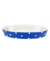 Make no stops from the oven to the table with this fun, oval casserole dish from Spode, featuring classic polka dots in a blue and white palette.