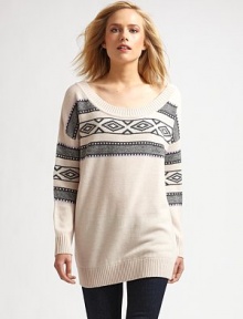 A cozy and colorful option for nice autumn mornings, crafted in luxurious wool with a trendy oversized silhouette.Scoop neckline Long sleeves Chest patterned stripes About 30 from shoulder to hem Wool; dry clean Imported