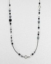 From the Quatrefoil Collection. An extra long sterling silver chain with bead and quatrefoil stations.Black onyx & hematite Sterling silver Can be worn doubled Length, about 48 Lobster clasp closure Imported 