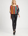 Stylishly slouched, wool-blend sweater in a vibrant striped pattern with dropped shoulders, cape sleeves and a secure banded hem. Draped roundneckDropped shouldersThree-quarter cape sleevesBanded hem70% acrylic/30% woolDry cleanImportedModel shown is 5'11 (178cm) wearing US size Small.