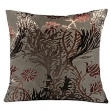 An intricate botanic print of vines lays gracefully on this decorative pillow. Fashioned from a fine silk, it makes a beautiful addition to any home.