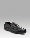 Driving loafer with signature brass horse bit. Also available in black with brass horse bit. Rubber sole Made in Italy 