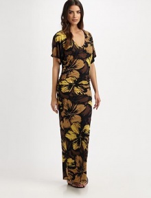 A gorgeous floral print with a curve-hugging maxi-dress fit creating a stunning and elongating coverup. V-neckShort sleevesPull-on style87% nylon/13% spandexHand washImported