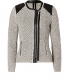 Lady-chic looks get an incredibly cool edge with Iros textural knit biker-style jacket, finished with luxe leather accents for that urbane feel - Rounded neckline, off-center front zip, leather shoulder patches and trim, zippered pockets, textural honeycomb knit - Slightly shorter, slim fit - Wear with everything from tees and leather leggings to pencil skirts and pumps