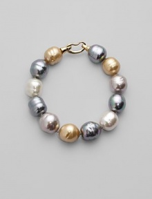 Soft shades come together in a substantial strand of lustrous baroque pearls. 14mm champagne, nuage, grey and white man-made, organic pearls 18k goldplated sterling silver spring clip clasp Length, about 8 Made in Spain