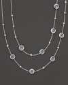 Sterling silver hammered ball illusion chain in clear quartz. Designed by Ippolita.