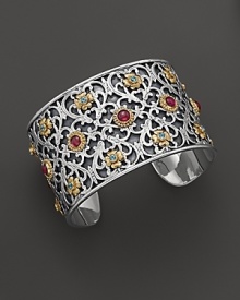 Inspired by ancient art, this sterling silver cuff features delicate 18K gold touches and polished stones of pink tourmaline and blue topaz. By Konstantino.