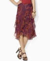 Tiers of ruffles and a sweeping paisley pattern enliven Lauren by Ralph Lauren's fluid silk georgette skirt.