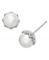 Polished to perfection. These stunning studs from Eliot Danori highlight simulation pearls (8 mm) with a crystal core and genuine mother-of-pearl coating. Surrounded by a crystal-accented design. Set in rhodium-plated silver tone mixed metal. Approximate diameter: 1/4 inch.