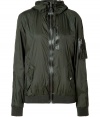 With its sporty styling and stylish slim cut, Marc by Marc Jacobs nylon jacket is a cool choice for working out or warm weather lounging - Stand-up collar, zippered front, long sleeves, elasticized zippered cuffs, snapped flap and zippered pockets, elasticized hemline - Slim fit - Wear with skinny jeans and retro-style sneakers