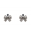 Lovely and ladylike. Betsey Johnson's delicate bow drop earrings will add feminine flair to virtually any outfit. Crafted in hematite tone mixed metal with sparkling crystal accents. Approximate drop: 1-1/10 inches.