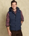 Mix it up. Put a spin on your outerwear with this stylish hooded puffer vest from Tommy Hilfiger.