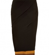 With an edgy-cool layered detailed hem and a figure-hugging silhouette, this versatile pencil skirt from Donna Karan is a must-have piece - Front and back draped details, fitted silhouette, layered hem - Style with a modernized button up, platform pumps, and a shoulder bag