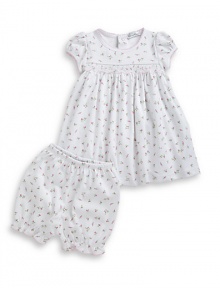 THE LOOKAllover charming rose printCap-sleeve dress with smocked front and contrast picot trimEmpire waistBack snapsRose print pants with elastic waist and ruffle cuffsTHE MATERIALPima cottonCARE & ORIGINMachine washImported