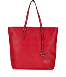 Sophisticated with simple, clean lines, MICHAEL Michael Kors textured leather tote is an elegant and versatile choice - Flat double top handles with buckle detail at base, metal logo on front, logo charm attached to handle, inside zippered back wall pocket, front wall slot pocket, cinch strap, strap with clip attached for keys - The perfect choice for work, school or running errands